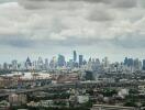 Cityscape view with skyline and clouds