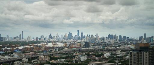 Cityscape view with skyline and clouds