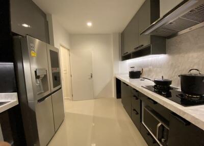 Modern kitchen with stainless steel appliances and ample counter space