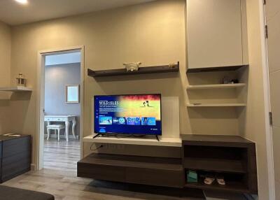 Modern living room with entertainment unit and TV