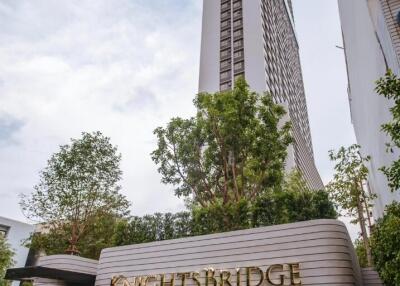 High-rise residential building with Knightsbridge signage