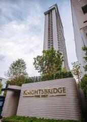 High-rise residential building with Knightsbridge signage