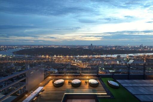 Rooftop terrace with city view during dusk