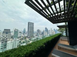 City skyline view from a high-rise building balcony