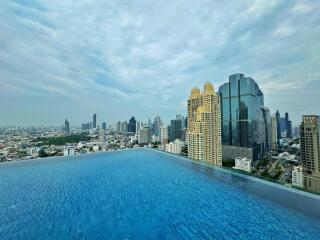 Infinity pool with city skyline view