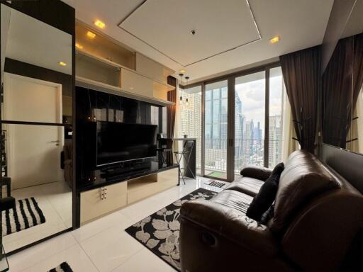 Modern living room with large windows and city view