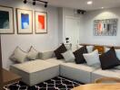 Modern living room with sectional sofa and wall art