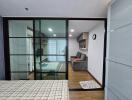 Modern living space with a sliding glass partition