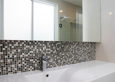 Modern bathroom with sink and mirror