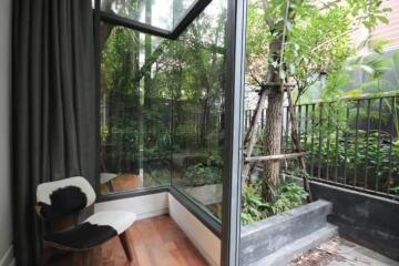 Cozy corner with large windows and garden view