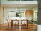 Modern kitchen and dining area with wooden furniture