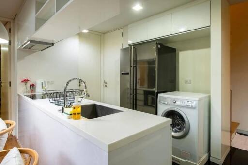 Modern kitchen with appliances and white countertops