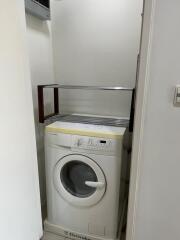 Compact laundry area with washer unit