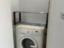 Compact laundry area with washer unit