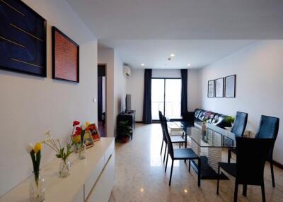 Spacious living room with dining area and modern decor