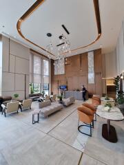 Modern lobby with seating area and high ceilings