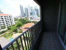 Balcony view of city skyline and nearby buildings