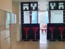 Modern kitchen with bar stools and hanging wine glasses