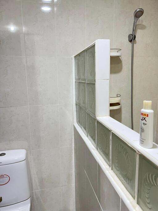 Modern bathroom with shower and toilet