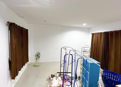 Unfurnished room with brown curtains