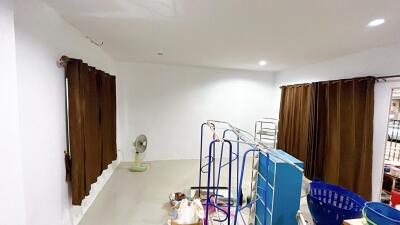 Unfurnished room with brown curtains