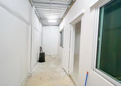 Interior corridor with white walls