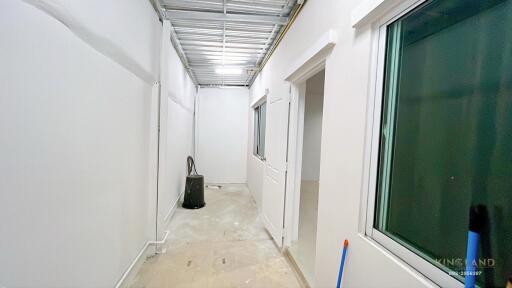 Interior corridor with white walls