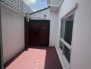 Outdoor courtyard with flooring and windows