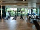 Well-equipped gym with cardio machines and weights