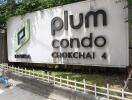 Exterior sign of Plum Condo Chokchai 4 building