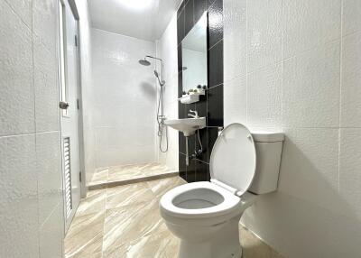 Modern bathroom with shower and toilet