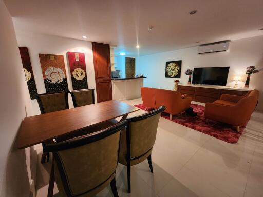 Spacious main living area with dining section, modern decor