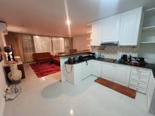 Open kitchen and living room with modern amenities