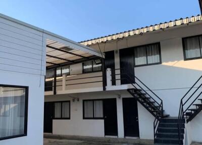 Two-story apartment building with outdoor stairs