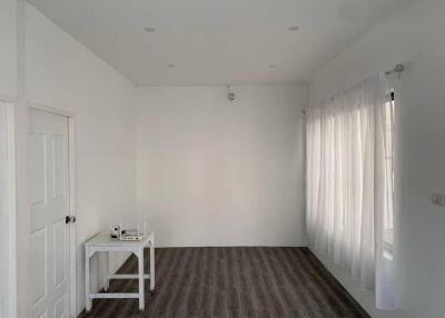 Minimalist empty living room with table and white curtains