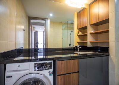 Modern bathroom with washing machine