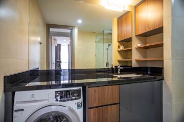 Modern bathroom with washing machine