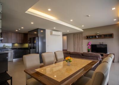 Modern open-concept living area with kitchen and dining space