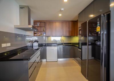 Modern kitchen with sleek cabinetry and appliances