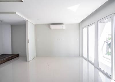 Bright and spacious main living area with large windows