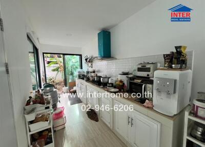 Modern kitchen with appliances and storage space