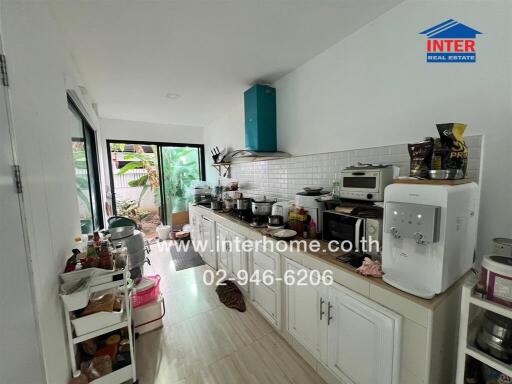 Modern kitchen with appliances and storage space