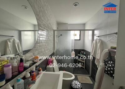 Bathroom with modern fixtures and ample storage