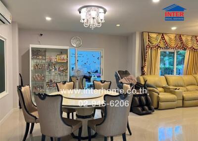 Living room with dining area and sofa