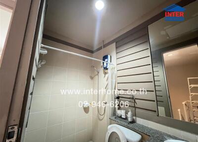 Bathroom with shower and toilet