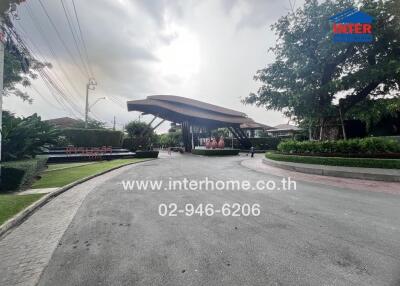 Entrance gate of a residential property with landscaping