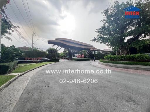 Entrance gate of a residential property with landscaping