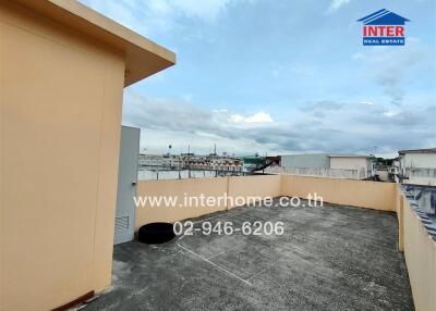 Rooftop patio with urban view