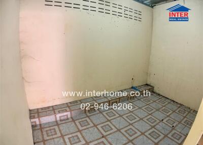 Empty indoor space with tiled floor