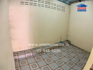 Empty indoor space with tiled floor